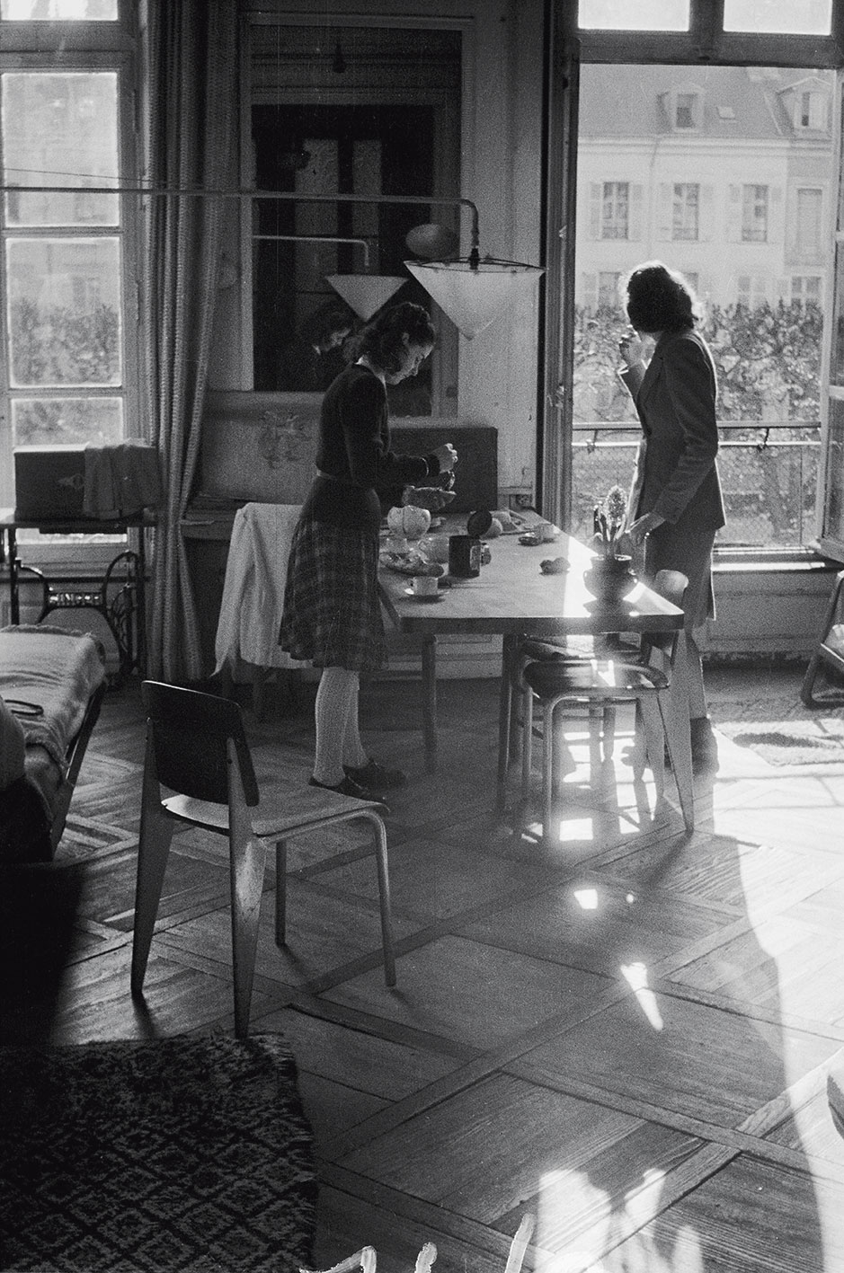 The Prouvé family’s apartment, Place de la Carrière, Nancy, c. 1943. The dining area with chairs no. 4 and a lift-up table.