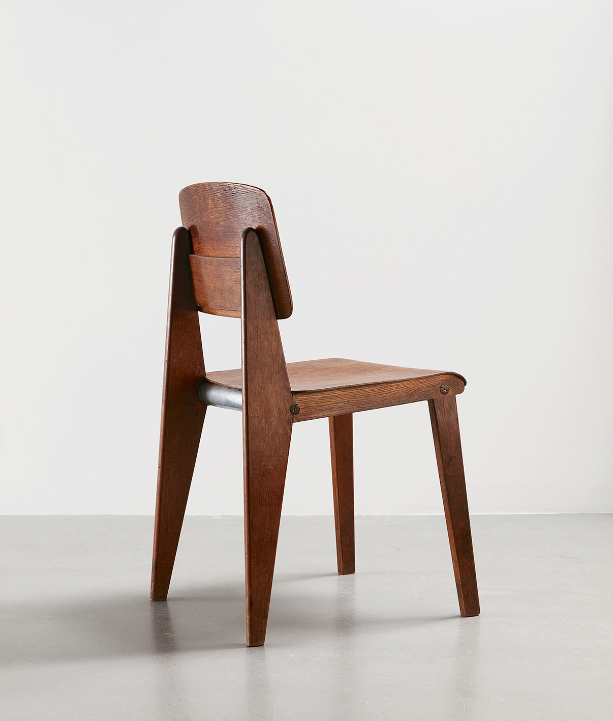 Demountable wooden chair CB 22, variant with tubular aluminum brace, c. 1947.