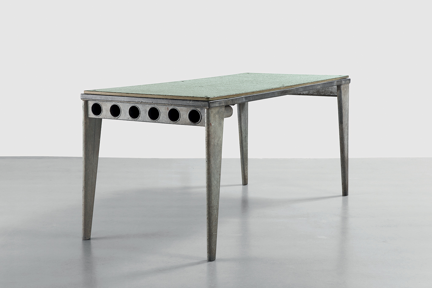 Refectory table with profiled legs, 1939. Galvanized steel sheet and Granipoli table top. Provenance: Colonie Sanitaire de Saint-Brévin l’Océan.