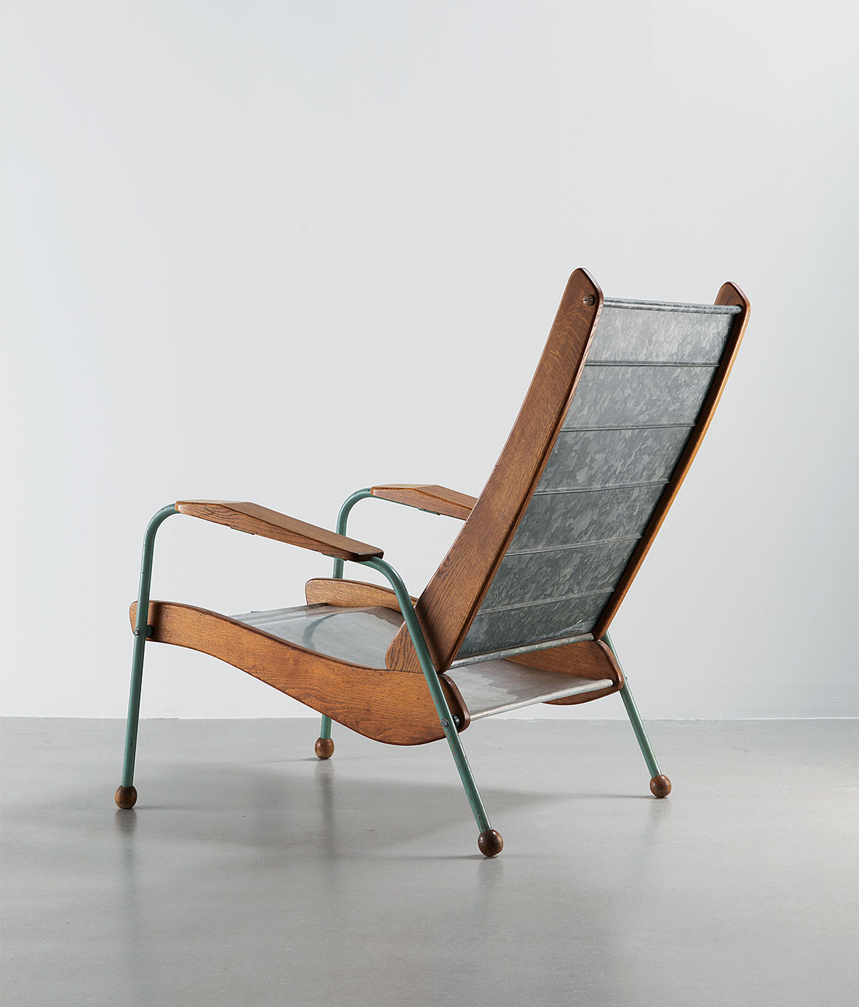 Armchair no. 352, variant with galvanized sheet steel backrest and sheet aluminum seat, ca. 1952.