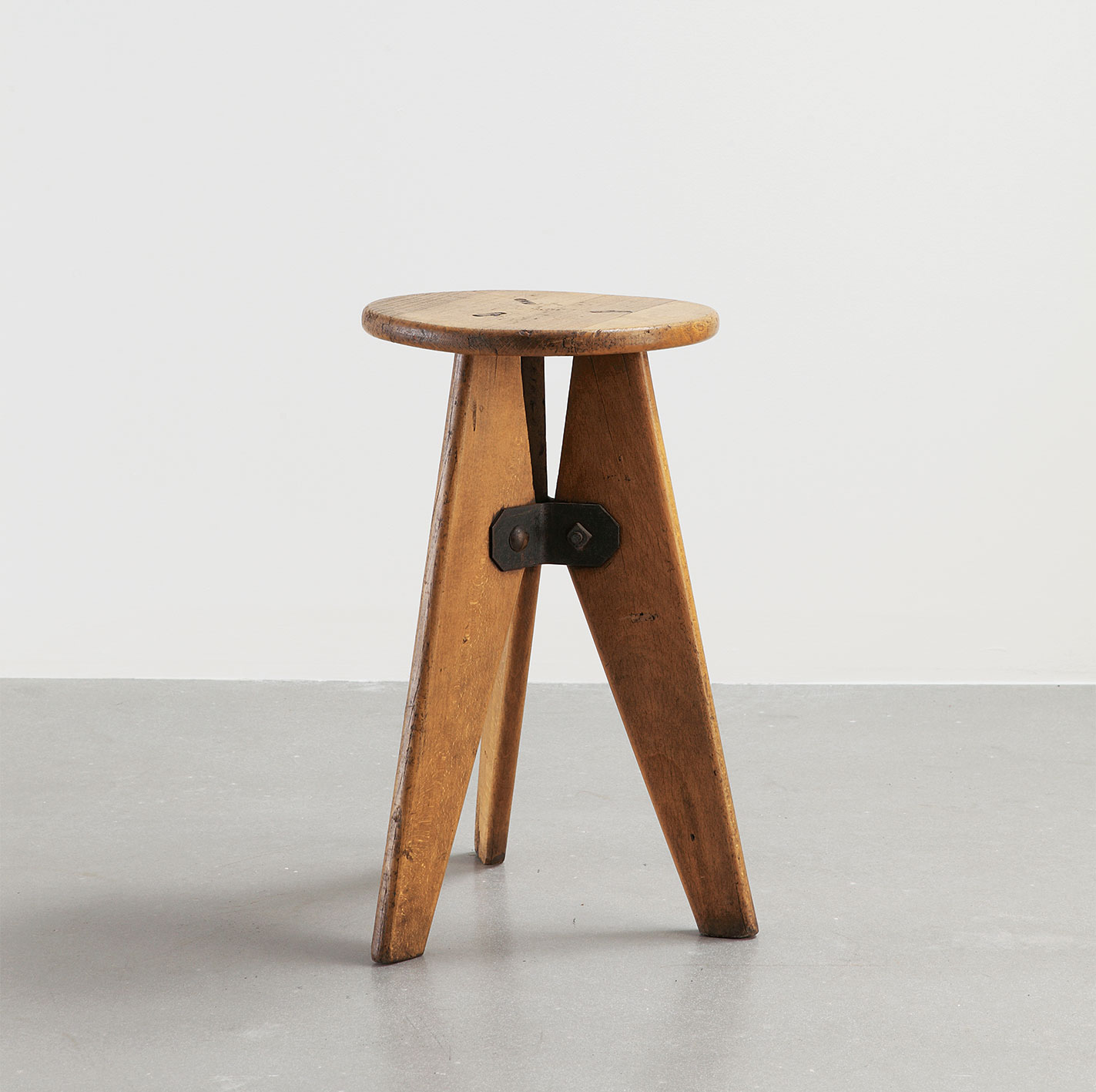 Solid wood, 3-legged stool, 1941.