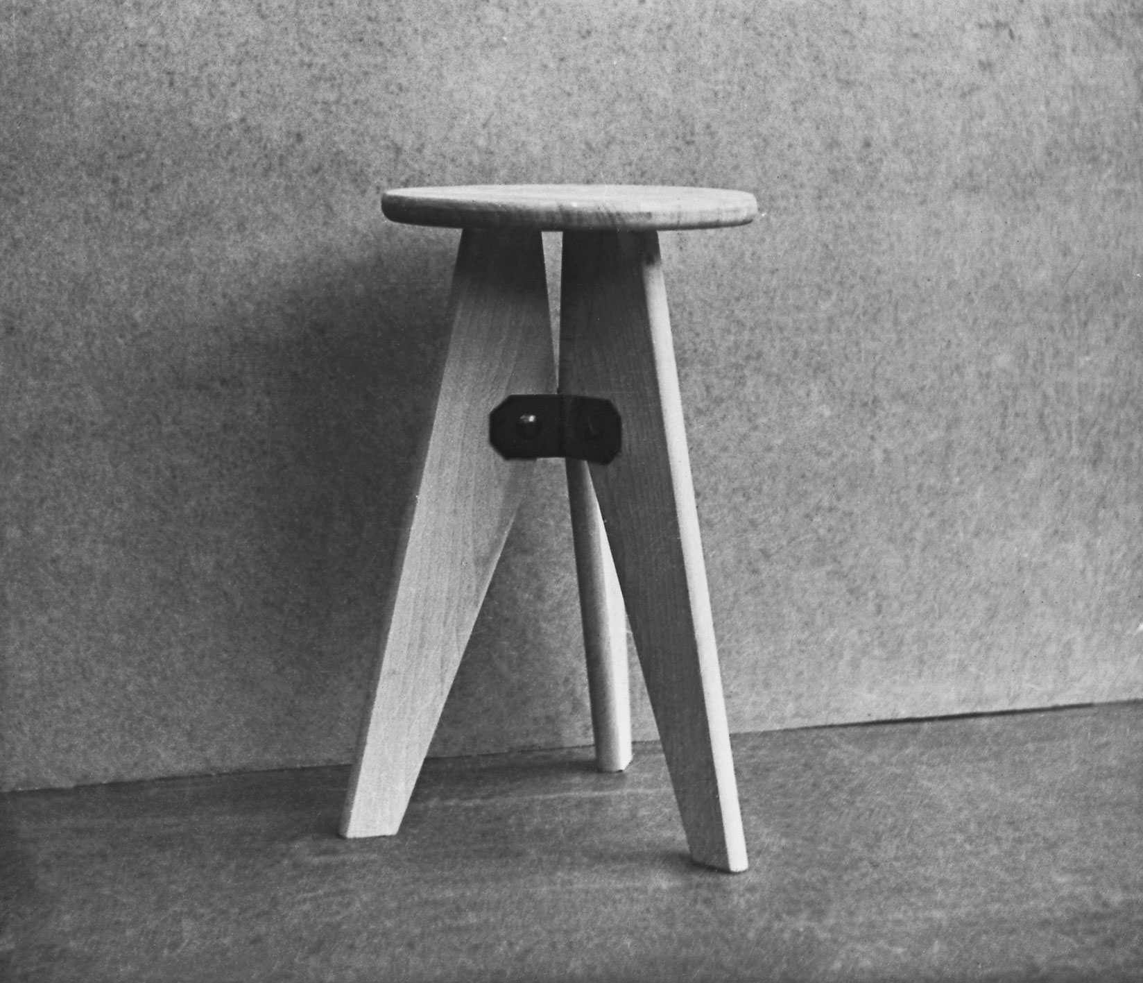 Solid wood, 3-legged stool, 1941. View in the workshop, undated.