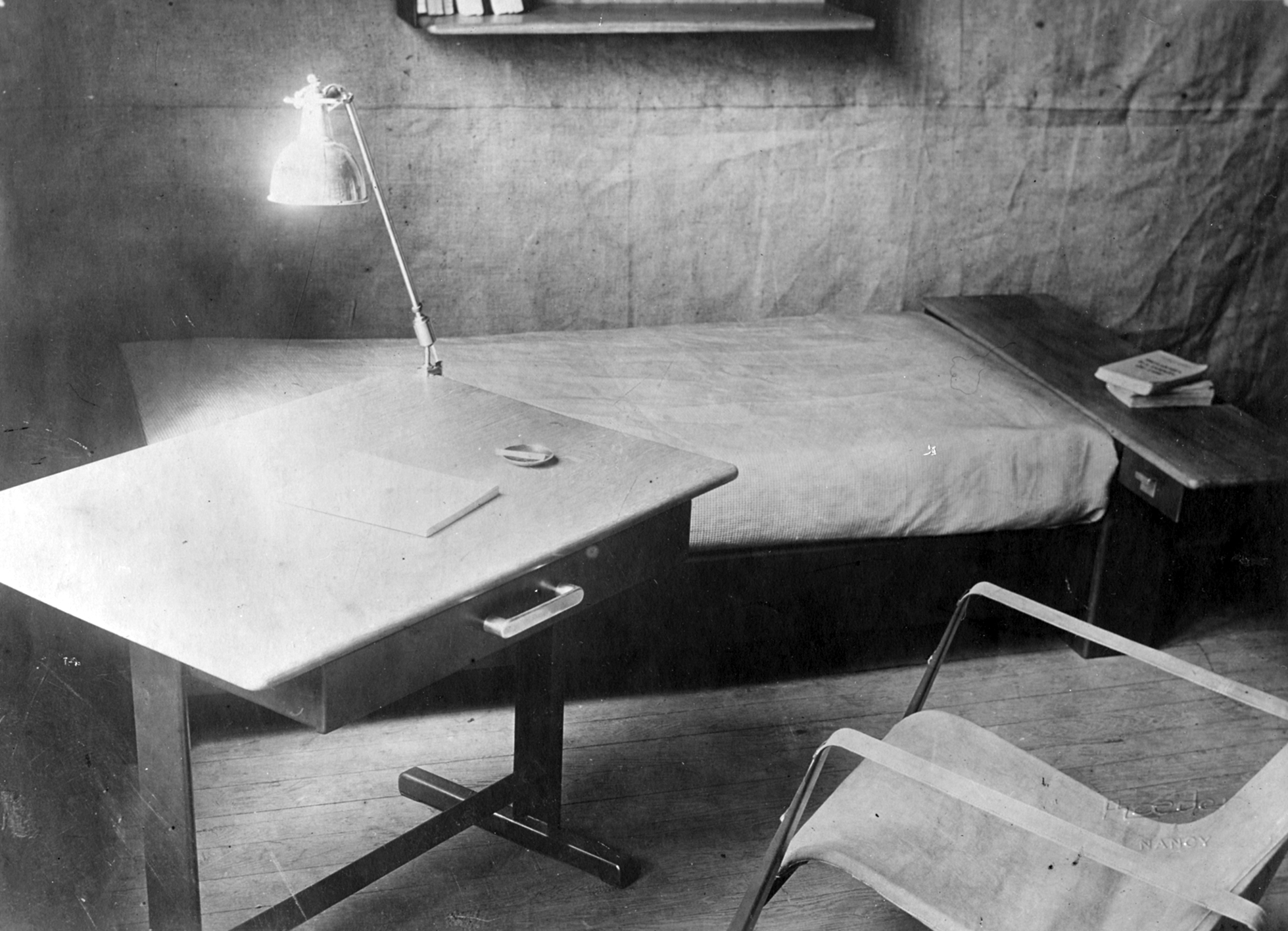 Prototype of a dormitory room presented for the competition for the furnishings of the Cité Universitaire in Nancy, ca. 1930: Cité armchair, bed and table.