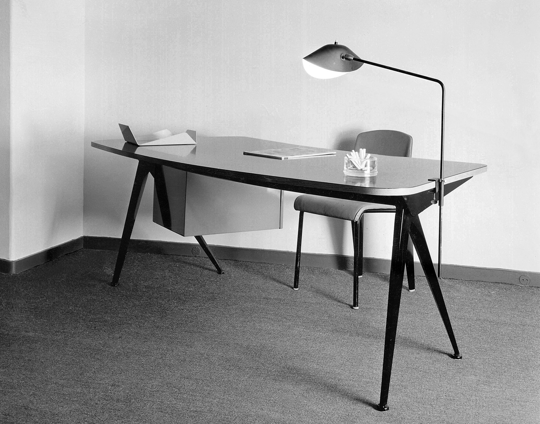Desk with Compas base and Métropole no. 306 chair, 1953.