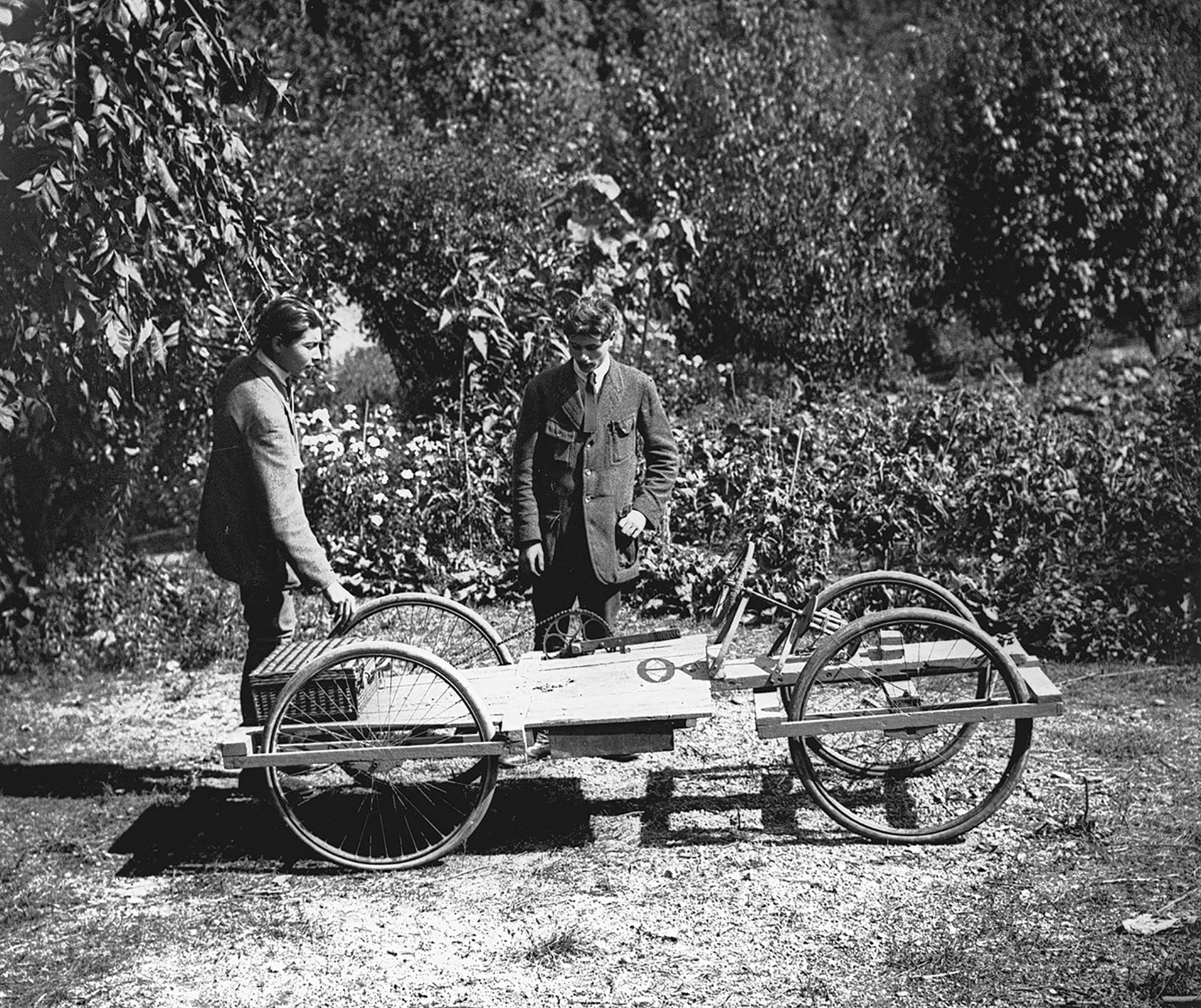 Jean Prouvé and his brother Vic studying a quadricycle, ca. 1918.