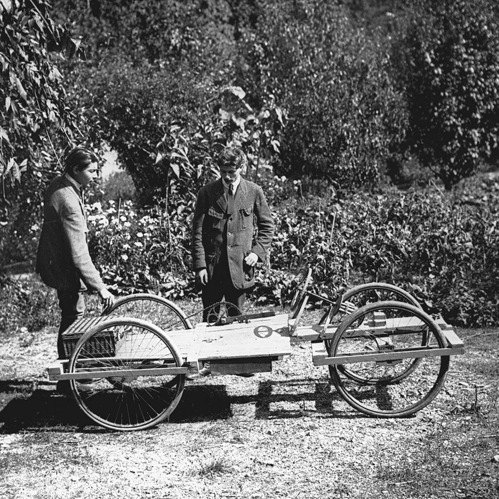 Jean Prouvé and his brother Vic studying a quadricycle, ca. 1918.