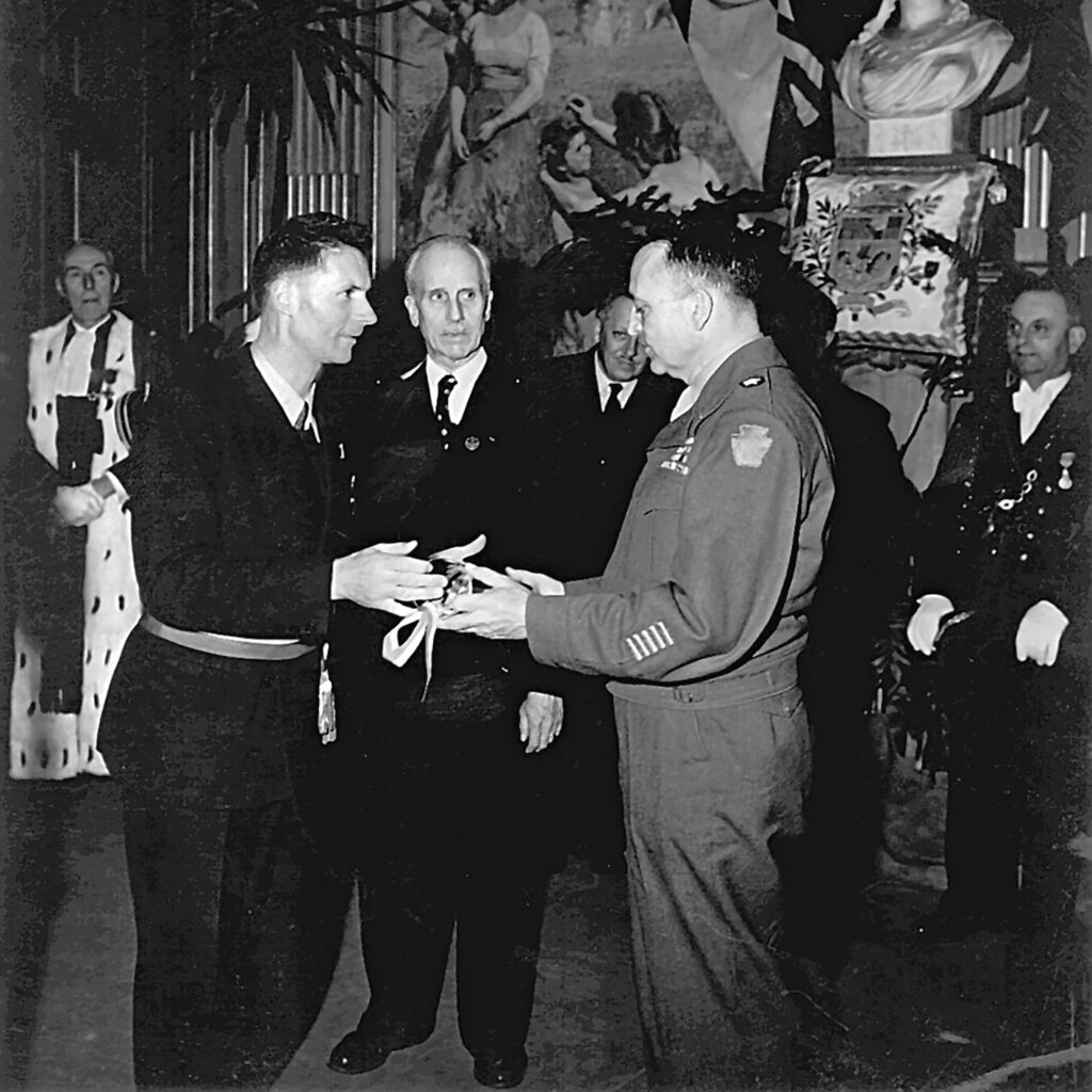 Jean Prouvé, mayor of Nancy, decorating General Sebree, liberator of the city, spring 1945.