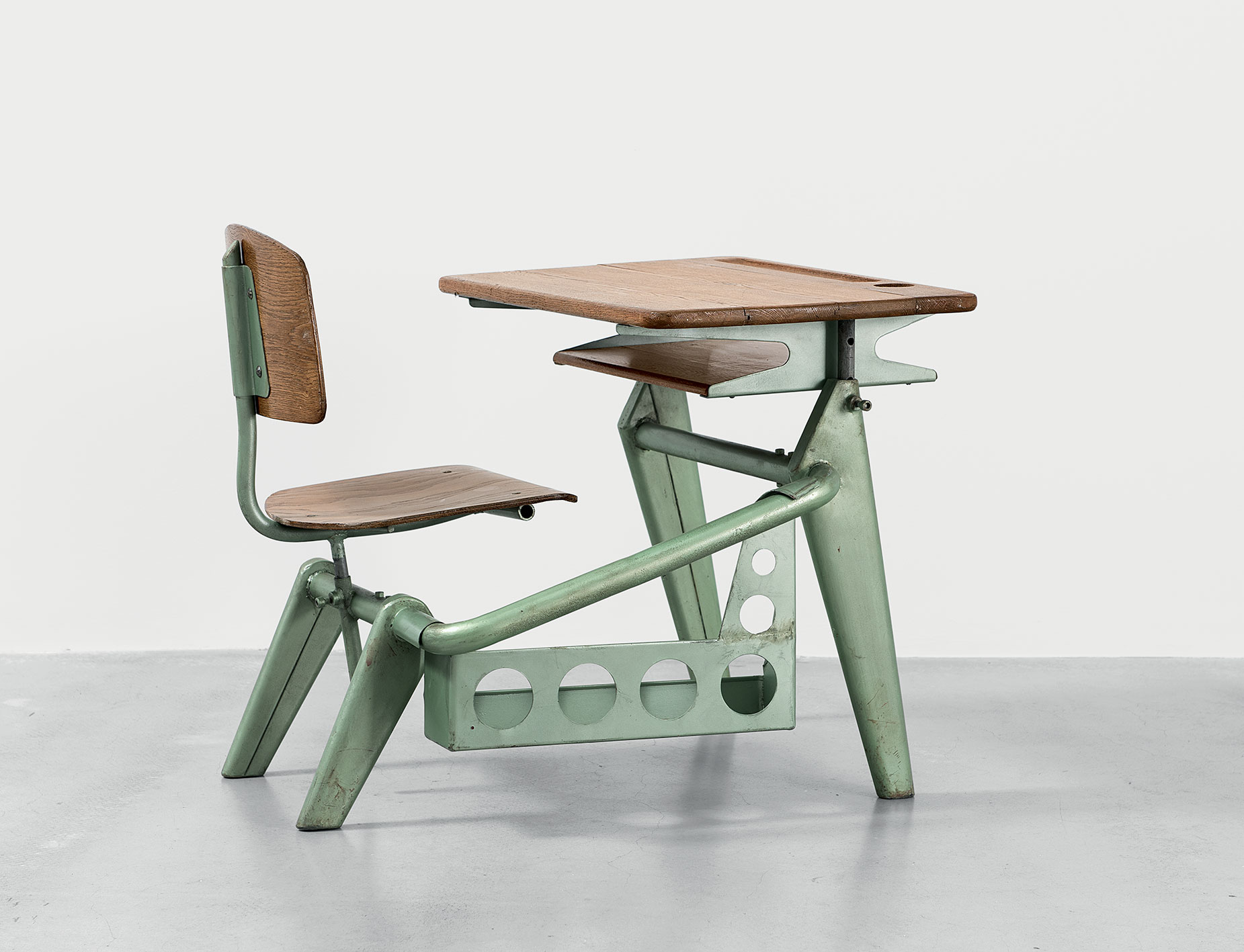 Adjustable single-seater school desk for ages 5–15, 1950.