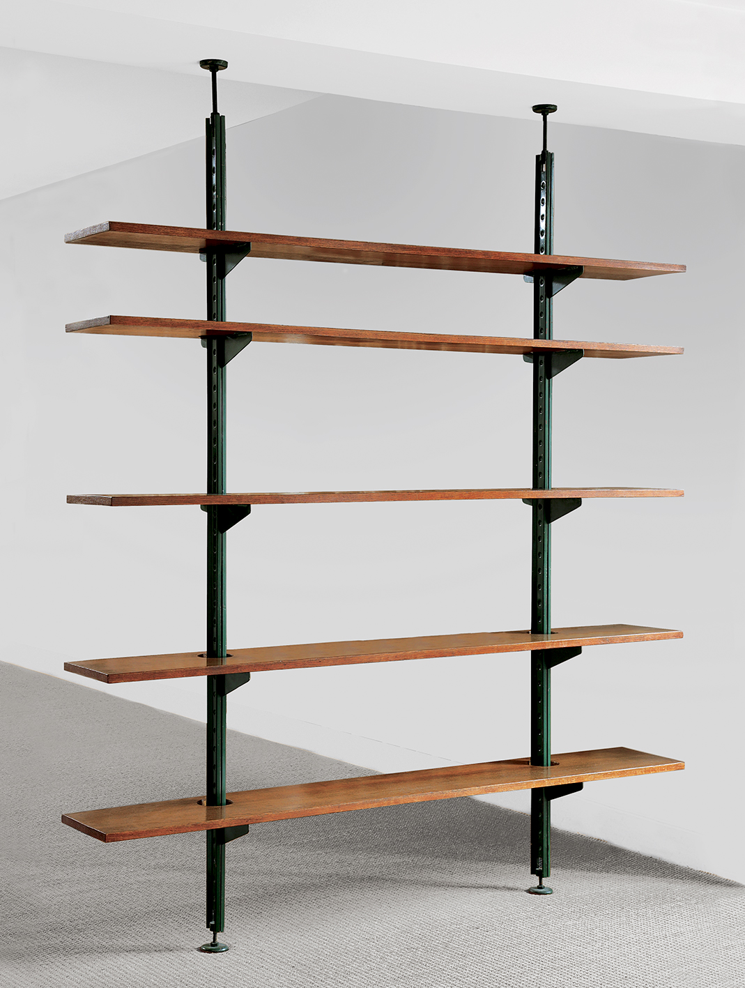 Shelves with support-channels and brackets, on pistons, balanced variant with double consoles, notched tablets, 1951. Provenance: Dollander Villa, Saint-Clair, Var.